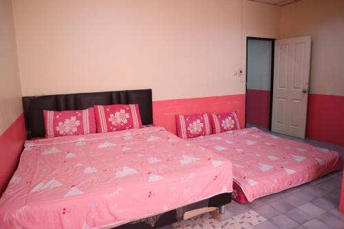 Een bed of bedden in een kamer bij Sam Resort Chaam