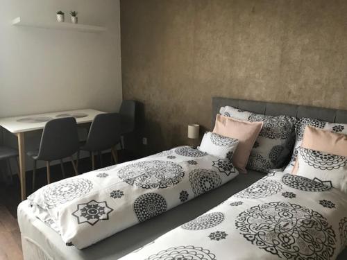 Postel nebo postele na pokoji v ubytování Apartmán Innova