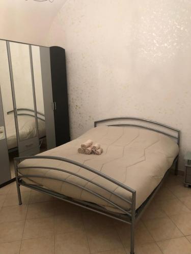 Postel nebo postele na pokoji v ubytování Il rifugio di Vaaz