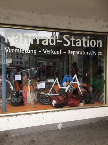 a store window with bikes and bags on display at Gästehaus Centro in Konstanz in Konstanz