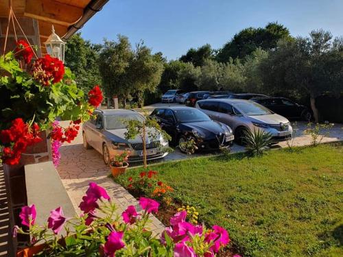 a group of cars parked in a parking lot at VILLA NIKOLINA in Medulin