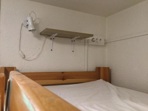 Postel nebo postele na pokoji v ubytování Studio Kandahar - Les 2 Alpes