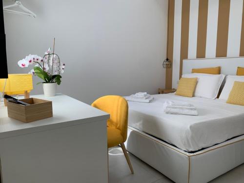 Postel nebo postele na pokoji v ubytování L'Ancora B&B