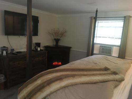 Ένα ή περισσότερα κρεβάτια σε δωμάτιο στο Starlight Lodge North Conway