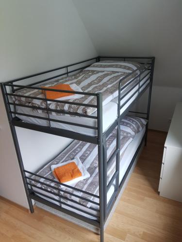 Postel nebo postele na pokoji v ubytování Holiday House Tereza