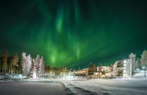 an image of the aurora dancing in the sky at Rokua Health & Spa in Rokua