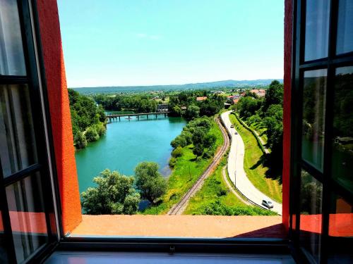 a view of a river from a window at Apartment Arcadia in Ozalj