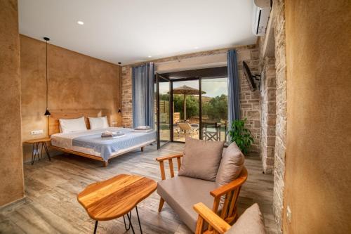 Posteľ alebo postele v izbe v ubytovaní Olive Luxury Suites - ADULTS ONLY