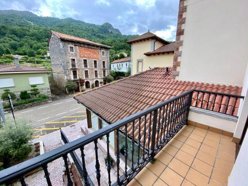 a balcony with a view of a street at Hotel La Cuna del Sella in Oseja de Sajambre