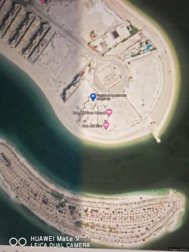 an aerial view of an island in the ocean at Ras Alkhyran Resort عائلات فقط in An Nāmī