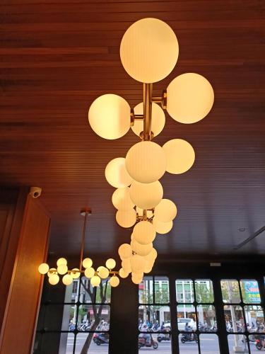 a chandelier hanging from the ceiling of a building at River inn Station in Kaohsiung
