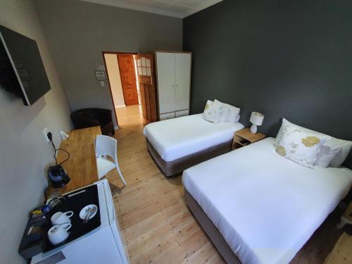 Katil atau katil-katil dalam bilik di Two Fat Owls Guesthouse