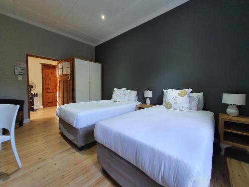 Katil atau katil-katil dalam bilik di Two Fat Owls Guesthouse
