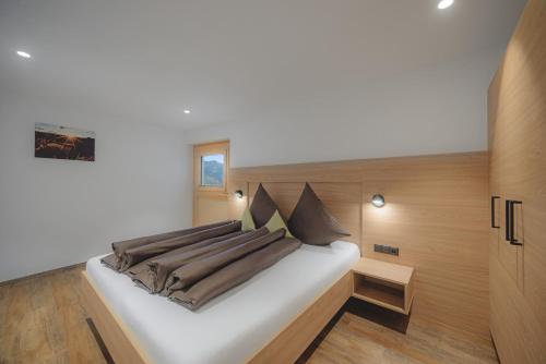 En eller flere senge i et værelse på Apart Blickfang