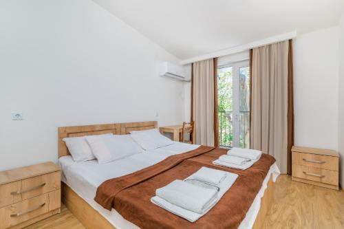 Postel nebo postele na pokoji v ubytování Hotel Continental