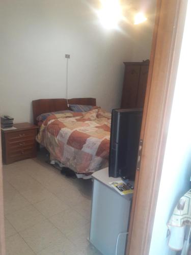 Posteľ alebo postele v izbe v ubytovaní Casa Vacanze Clementina