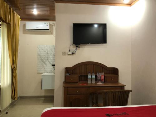 RedDoorz near XT Square 3にあるテレビまたはエンターテインメントセンター