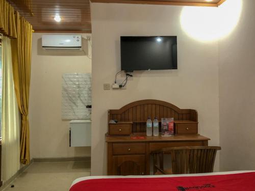 RedDoorz near XT Square 3にあるテレビまたはエンターテインメントセンター