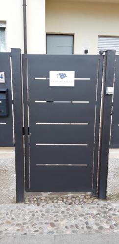 a large metal garage door in front of a building at Casa Marilla in Malcesine
