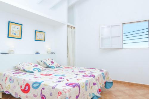Postel nebo postele na pokoji v ubytování Ses Barreres