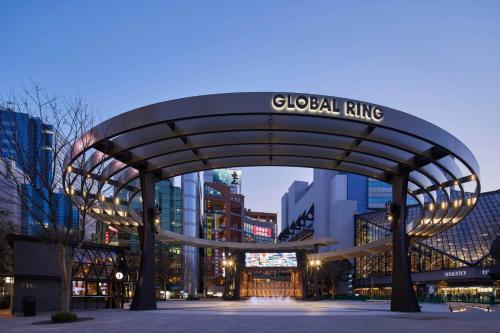 a global ring in the middle of a city at Tabist Hotel Aurora Ikebukuro in Tokyo