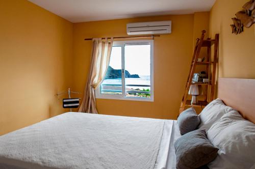 Кровать или кровати в номере CASA LA ISLETA PLAYA