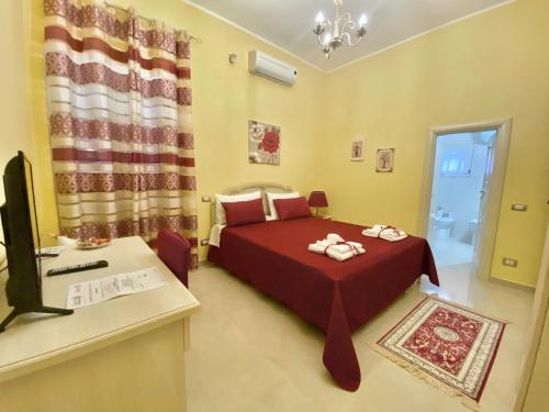 Postel nebo postele na pokoji v ubytování B&B Smeraldo