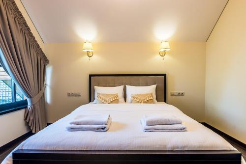 Cama o camas de una habitación en Villa Avirio Vingis