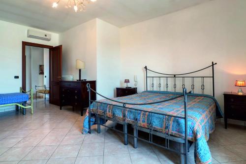 Giường trong phòng chung tại Villa Daniela Porto Cesareo Salento