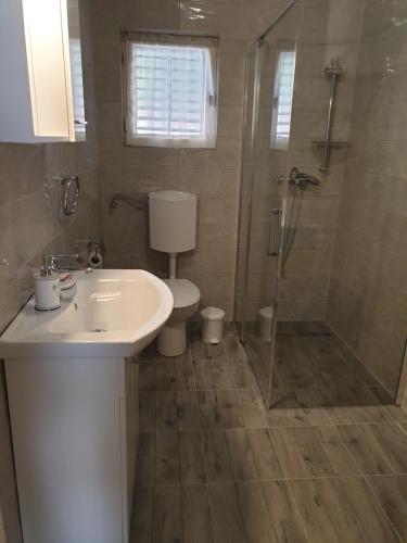 Kúpeľňa v ubytovaní Apartman Davorka