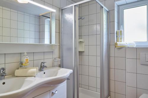 Ett badrum på Apartments Kirchebnerhof