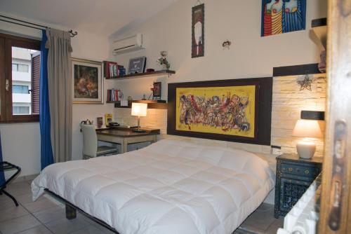 Ένα ή περισσότερα κρεβάτια σε δωμάτιο στο Guesthouse Nuvole