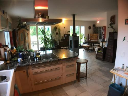 a kitchen with a sink and a counter top at Centre ViaYoga in Saint-Cergue