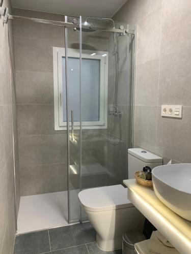 Koupelna v ubytování San Lorenzo Apartamentos y Suites