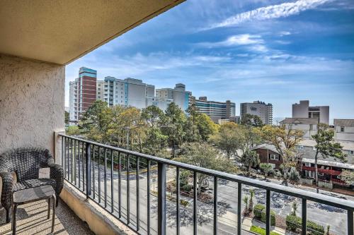 a balcony with a view of a city at 1 Block to Ocean Shore Condo in Myrtle Beach! in Myrtle Beach