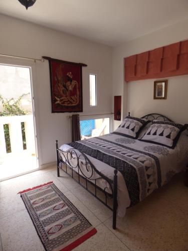 Una cama o camas en una habitación de Janna d'Ifni