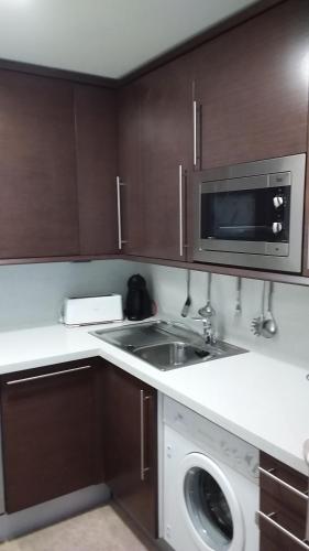 Η κουζίνα ή μικρή κουζίνα στο Apartament Vistamar