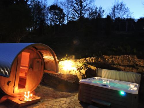 a hot tub and a iglooificialificialificialificialificialificialificialificialificial at Seveniger Mühle in Sevenig