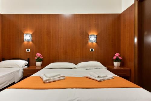 Posteľ alebo postele v izbe v ubytovaní B&B Termini