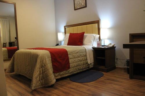Postel nebo postele na pokoji v ubytování Hotel JYE by Serranillo, Mineral del Monte Hgo