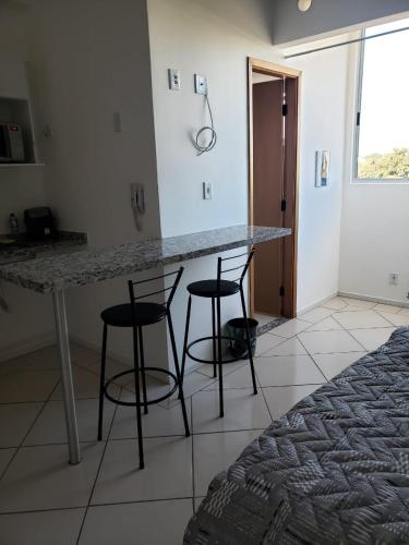 Postel nebo postele na pokoji v ubytování Spot Residence São Carlos 700m da USP