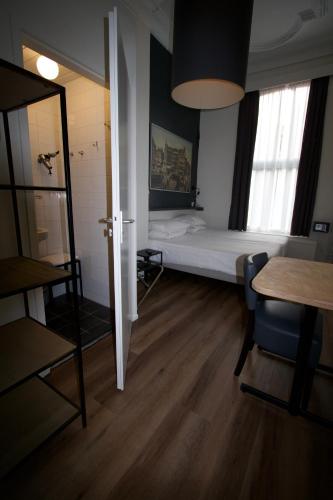 Cama o camas de una habitación en Hotel Hortus