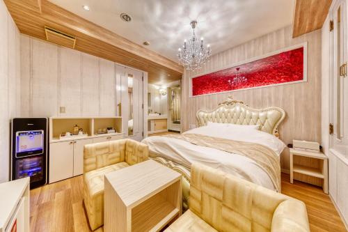 Krevet ili kreveti u jedinici u objektu Hotel Luna Ibaraki(Adult Only)