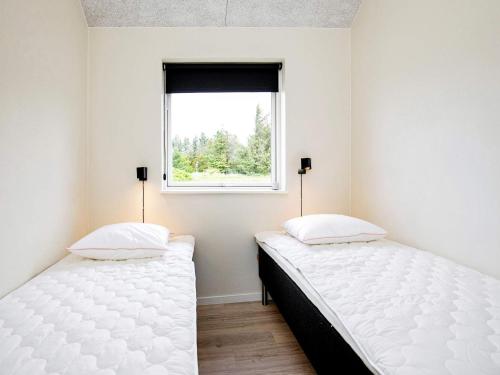Postel nebo postele na pokoji v ubytování Holiday home Thisted XXXIII