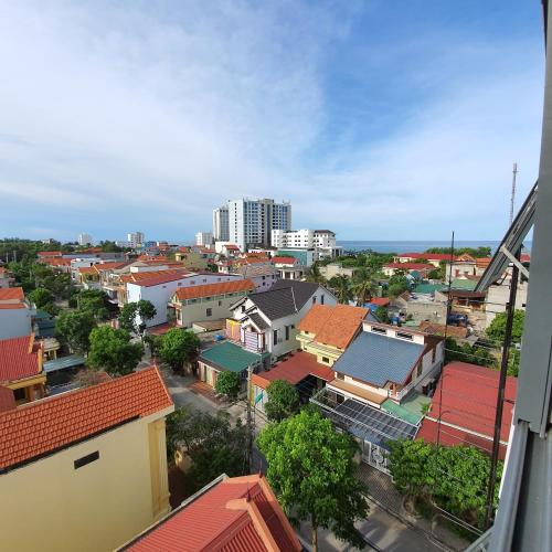 an aerial view of a city with buildings at Cagina Boutique Hostel in Dong Hoi
