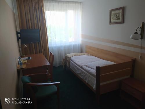 Telewizja i/lub zestaw kina domowego w obiekcie Hotel Konin