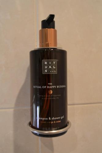 a bottle of therapy lithium sitting on a bathroom counter at Hotel Ter Polders in Damme