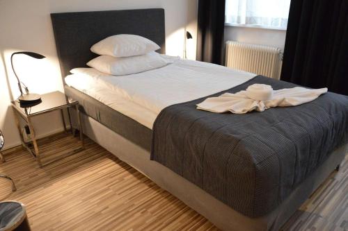 Postel nebo postele na pokoji v ubytování Best Western Hotel Anno 1937