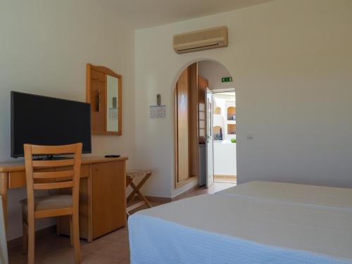 Katil atau katil-katil dalam bilik di Luz Bay Hotel