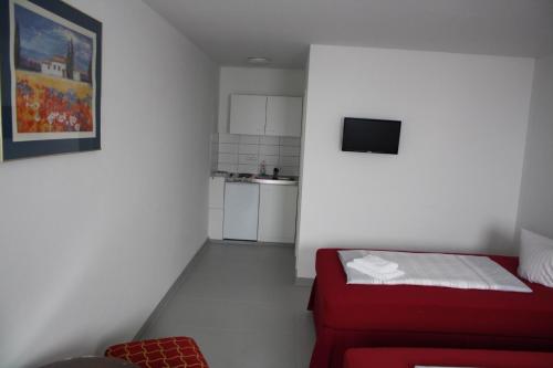 Una cama o camas en una habitación de Pension Probstheida UG